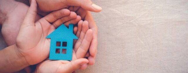 mini house in hands