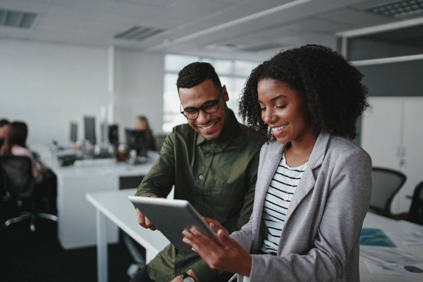 Careers couple looking at device