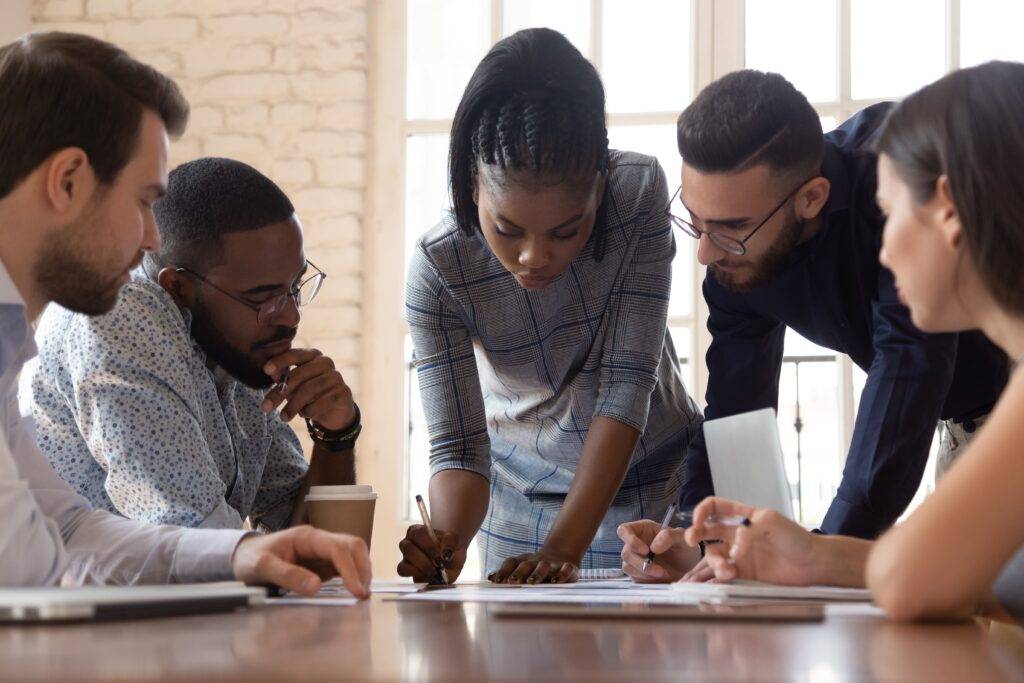 Colleagues around a desk